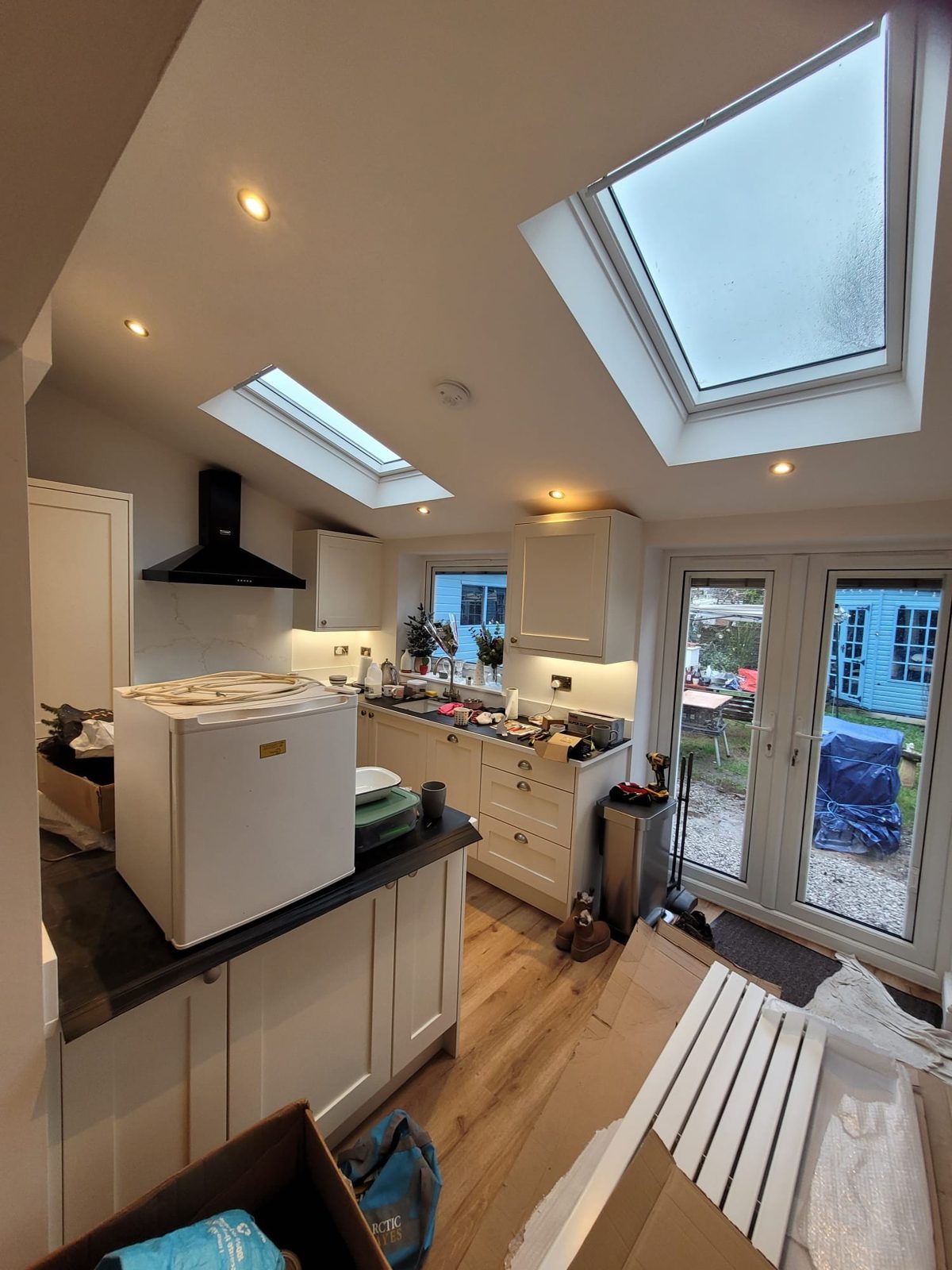 Open plan kitchen extension with rooflights over the island, Longmore Construction, Warrington
